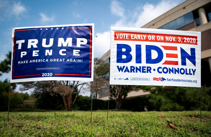 Yard signs supporting U.S. President Donald Trump and Democratic U.S. presidential nominee and former Vice President Joe Biden (photo credit: REUTERS/AL DRAGO/FILE PHOTO)