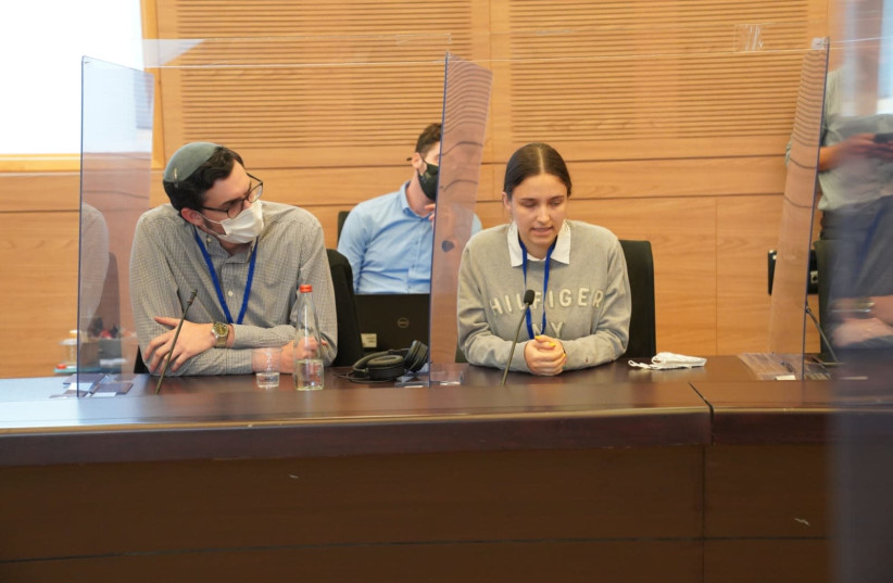 Rafael Kelner Polisuk and Shoshana Raizel, two Jewish youth who underwent conversion therapy at a committee meeting on a bill to ban such therapies (photo credit: DANI SHEM TOV/KNESSET SPOKESPERSONS OFFICE)