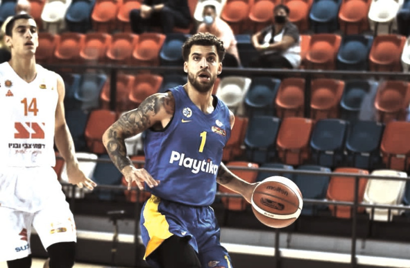 MACCABI TEL AVIV guard Scottie Wilbekin led the yellow-and-blue to a 20-point conquest of Maccabi Rishon Lezion in their Winner Cup semifinal duel.  (photo credit: DOV HALICKMAN PHOTOGRAPHY)