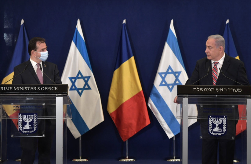 Israeli Prime Minister Benjamin Netanyahu meets with Romanian Prime Minister Ludovic Orban at the King David Hotel in Jerusalem, 03.11.2020. (photo credit: KOBI GIDEON/GPO)