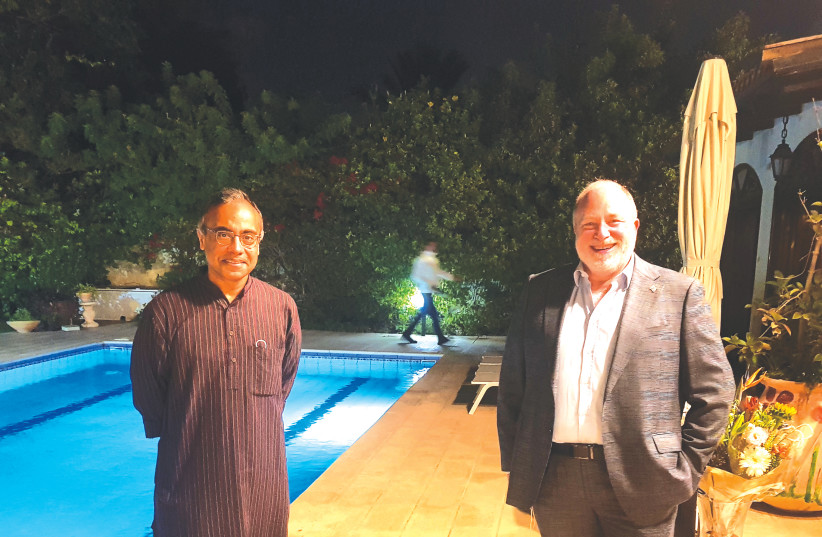INDIAN AMBASSADOR Sanjeev Singla with Meron Reuben, the outgoing chief of state protocol. (photo credit: STEVE LINDE)