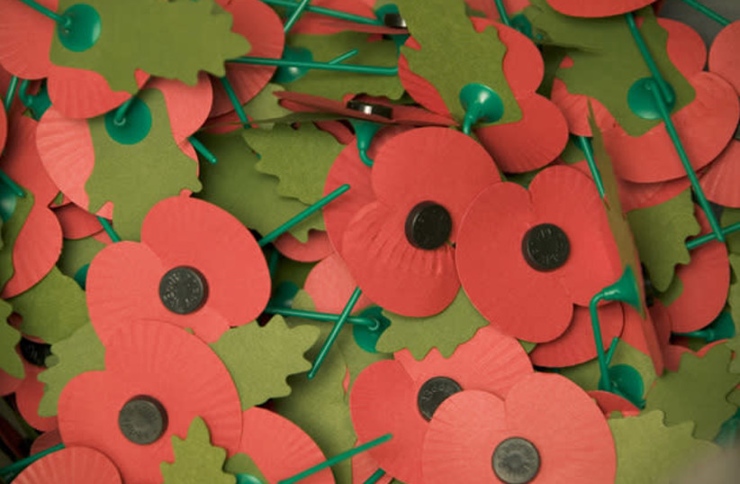 ‘IN FLANDERS fields the poppies blow’: British remembrance poppies. (photo credit: Wikimedia Commons)