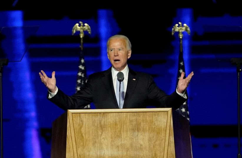 Democratic 2020 US presidential nominee Joe Biden speaks at his election rally, after news media announced that Biden has won the 2020 US presidential election, in Wilmington, Delaware, US, November 7, 2020. (photo credit: ANDREW HARNIK/POOL VIA REUTERS)