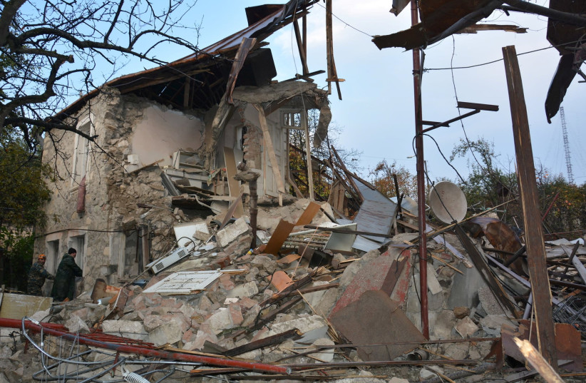 A view shows what is said to be the aftermath of recent shelling in the city of Stepanakert during a military conflict over the breakaway region of Nagorno-Karabakh, November 6, 2020 (photo credit: ARMENIAN UNIFIED INFOCENTRE/HANDOUT VIA REUTERS)