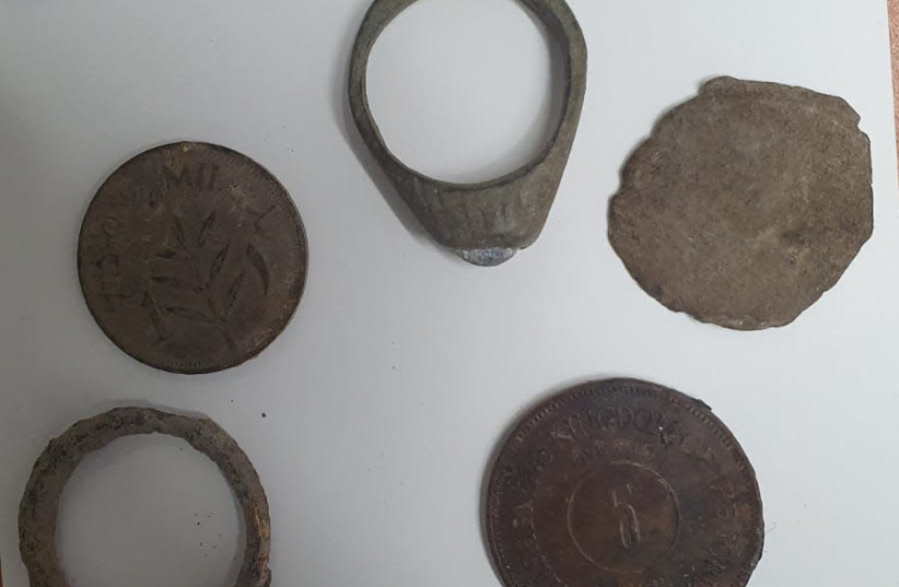 Some of the stolen antiquities, including ancient coins and rings, found in the suspects' possession, Nov. 9, 2020. (photo credit: POLICE SPOKESPERSON'S UNIT)