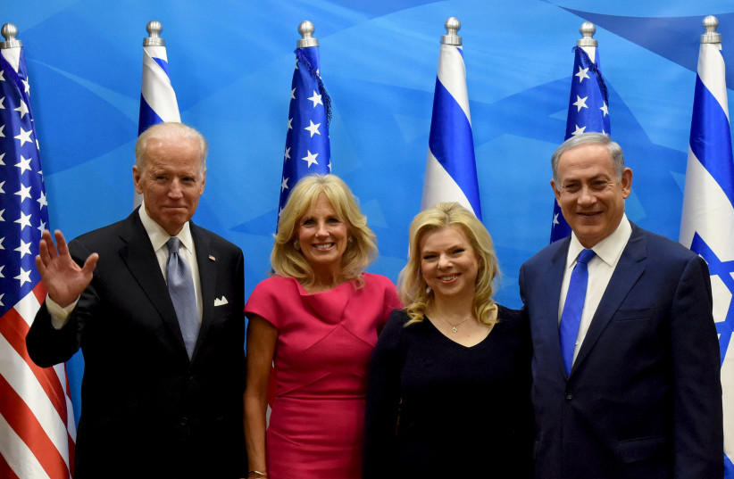 Then-vice president Joe Biden and his wife Jill pose for a photograph with Prime Minister Benjamin Netanyahu and his wife Sara in Jerusalem on March 9, 2016 (photo credit: DEBBIE HILL/REUTERS)