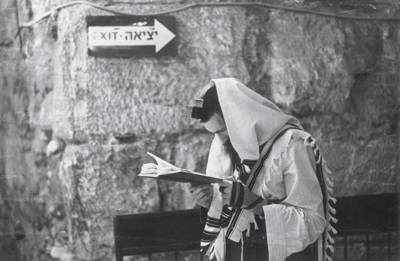 A soldier praying in a tunnel to the north of the Western Wall Plaza (photo credit: MICHAEL ZIMMERMAN)