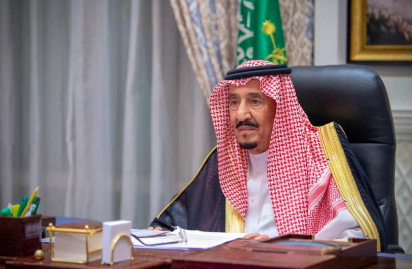 Saudi King Salman bin Abdulaziz gives virtual speech during the first session of Shura council, from his palace in NEOM, Saudi Arabia, November 11, 2020.  (photo credit: BANDAR ALGALOUD / SAUDI ROYAL COURT / REUTERS)