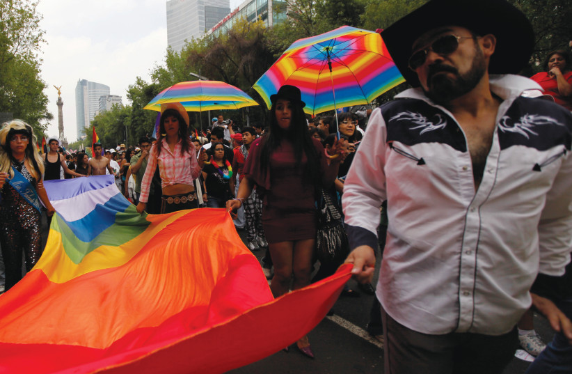LGBT RIGHTS activists take part in a pride parade in Mexico City in 2009 (photo credit: ELIANA APONTE/REUTERS)