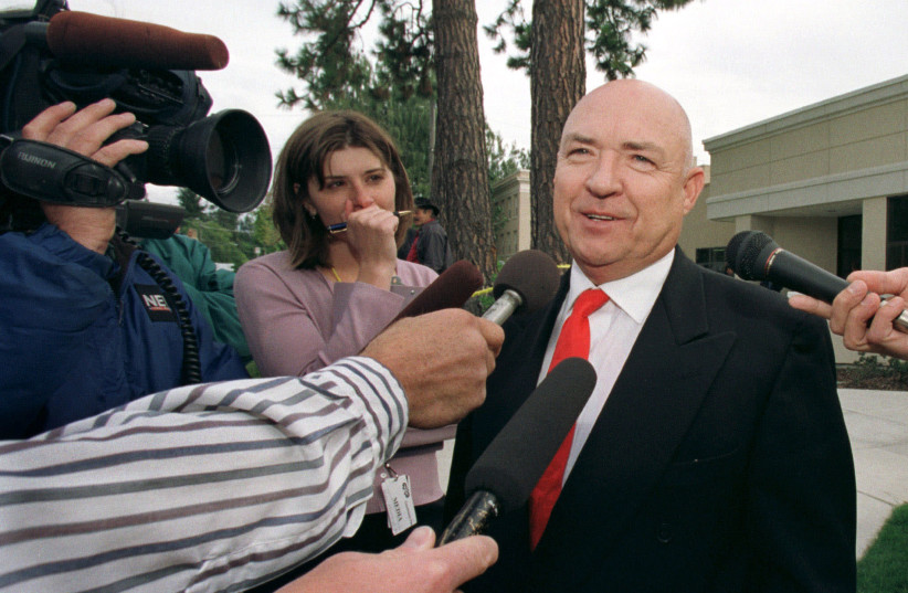 Tom Metzger (R), founder of the White Aryan Resistance, talks to the media outside the Kootenai County Justice Building in Coeur d' Alene, Idaho, September 5, 2000. (photo credit: REUTERS)