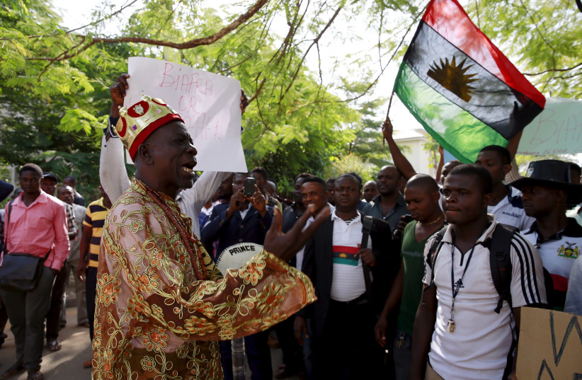 Traditional ruler Prince Ozo Onna joins supporters of Indigenous People of Biafra (IPOB) leader Nnamdi Kanu in a rally, as he is expected to appear at a magistrate court in Abuja, Nigeria December 1, 2015. Kanu - an activist who divides his time between the UK and Nigeria, spreading his ethos on soc (photo credit: REUTERS)