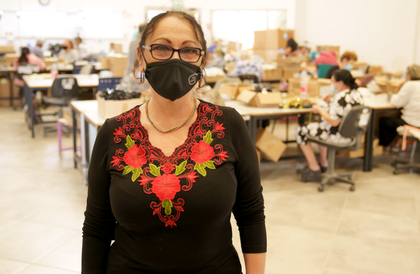 Svetlana Grosha, who oversees the wellbeing of those who work at the "factory." "We have everyone here," she says. (photo credit: GABY MOATTY)
