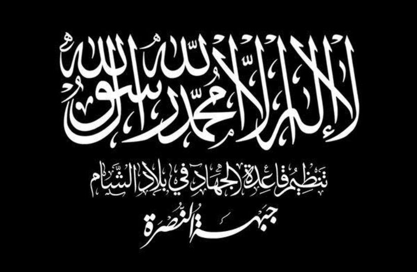 Flag of al-Qaeda (photo credit: Wikimedia Commons)
