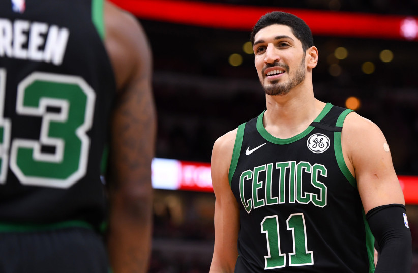 Boston Celtics center Enes Kanter (11) reacts against the Chicago Bulls during the second half at the United Center (photo credit: MIKE DINOVO/USA TODAY SPORTS)