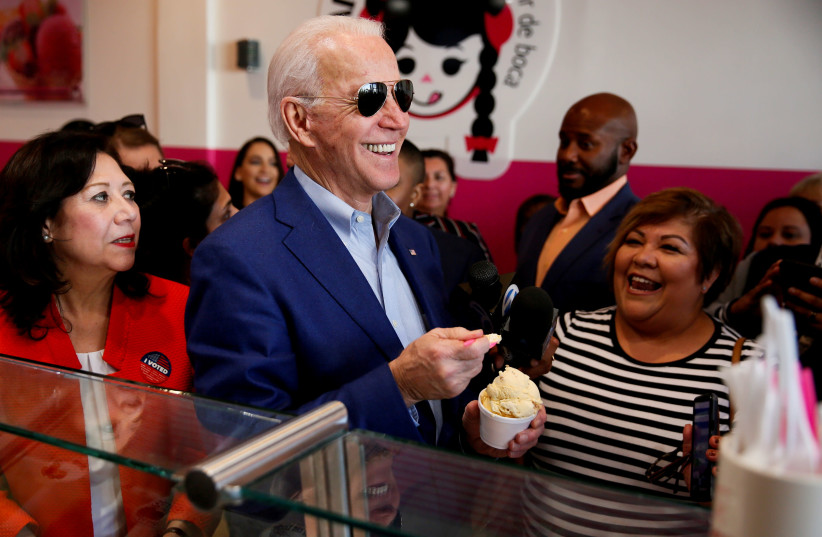 Democratic US prJoe Biden gets ice cream at La Michoacana during the state's Democratic presidential primary election on Super Tuesday in Los Angeles, California, US, March 3, 2020. (photo credit: REUTERS/ELIZABETH FRANTZ)