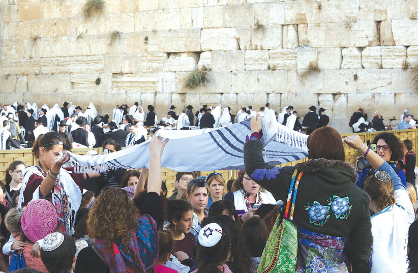 A BAT MITZVAH is held at the Kotel. (credit: MARC ISRAEL SELLEM/THE JERUSALEM POST)