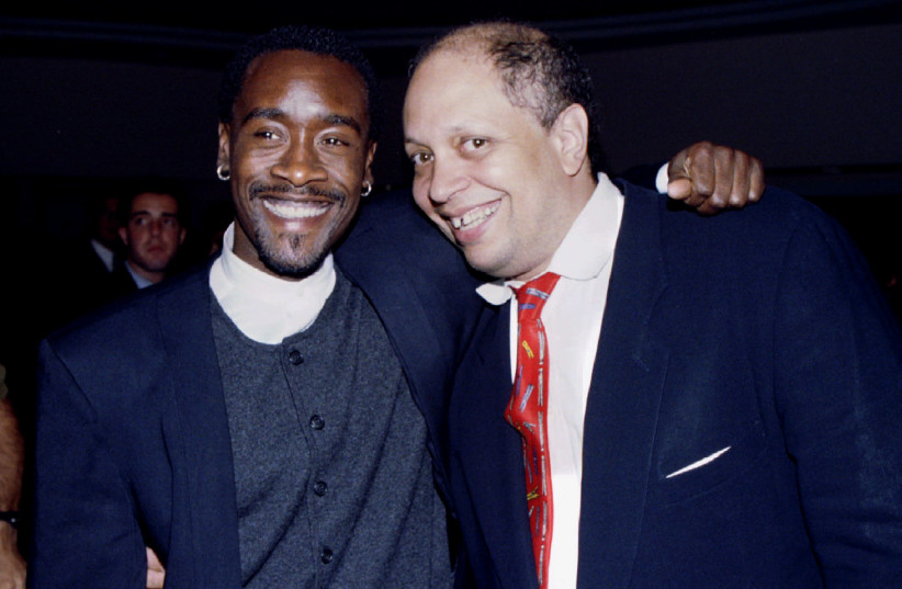 Actor Don Cheadle (L), one of the co-stars in the new film "Devil In A Blue Dress," poses with novelist Walter Mosley at the post-premiere party at The Beverly Hills Hotel, September 22. The film, based on Mosley's novel of the same name, is set in Los Angeles during the 1940's and deals with the in (photo credit: REUTERS)