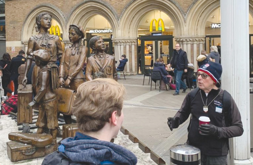 Ian Fagelson gives his Jewish London tour online, and at the Kindertransport statue at London's Liverpool Street Station (photo credit: Courtesy)