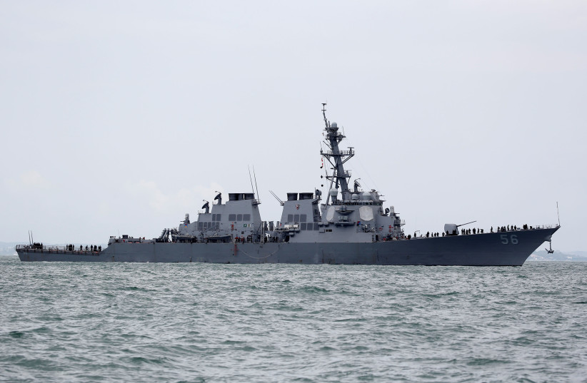 The US Navy guided-missile destroyer USS John S. McCain is seen after a collision, in Singapore waters August 21, 2017. (photo credit: AHMAD MASOOD/REUTERS)