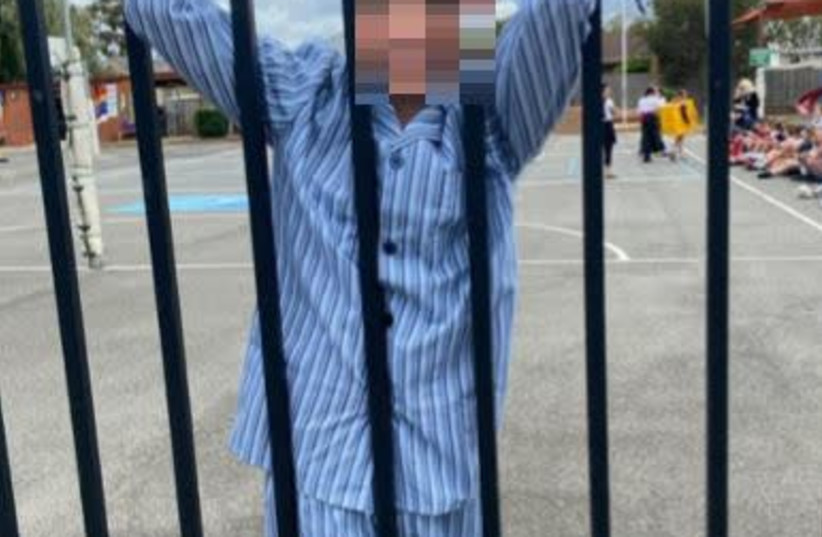 A student at St. John Vianney Primary School in Melbourne, Australia, is seen dressed up as a concentration camp inmate in a photo shared on social media. (photo credit: SCREENSHOT FROM FACEBOOK/ANTI-DEFAMATION COMMISSION)