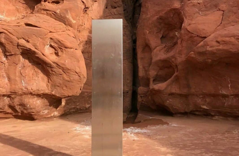 A metal monolith is pictured in a remote area of Red Rock Country in Utah, US November 18, 2020. (photo credit: UTAH DEPARTMENT OF PUBLIC SAFETY VIA REUTERS)