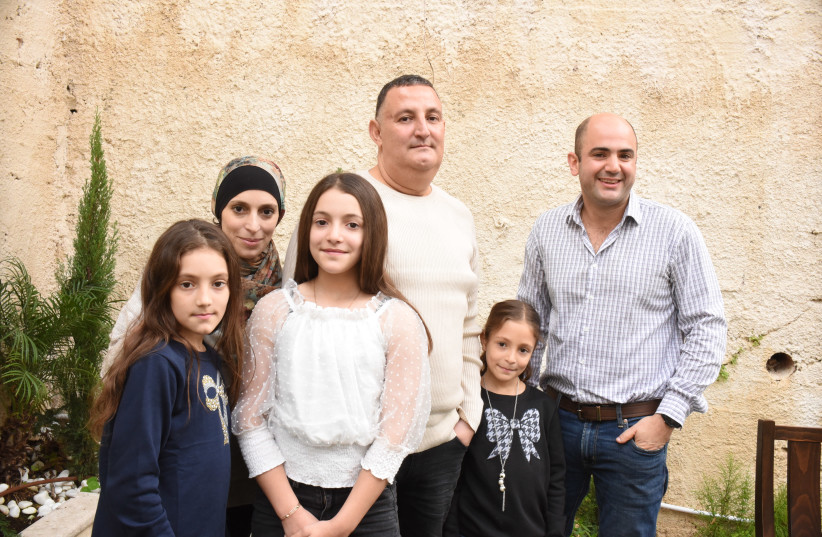 THE RAHMAN family with Dr. Samuel Moscovici (far right). (photo credit: DAVID ZEV HARRIS)