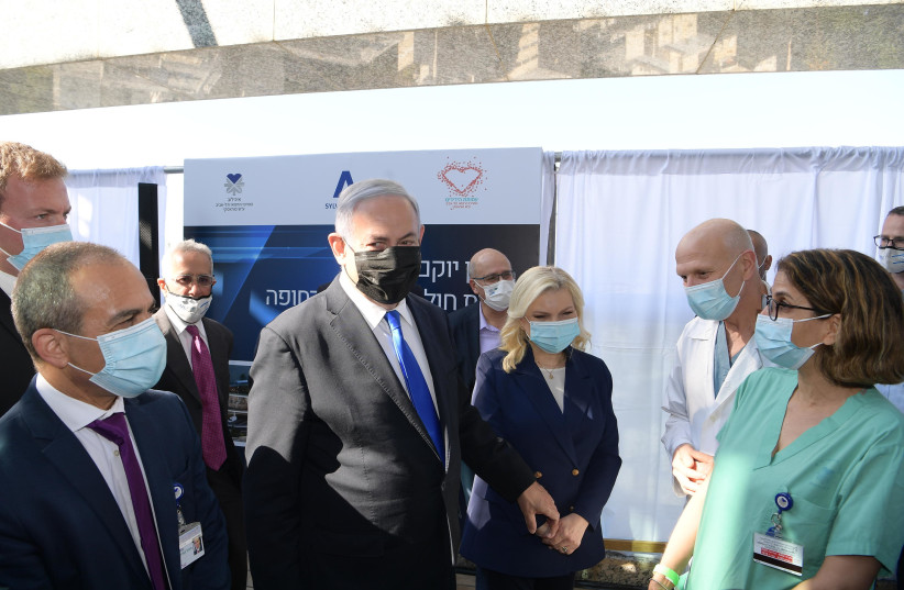 Prime Minister Benjamin Netanyahu at the cornerstone laying ceremony for an emergency hospital at Ichilov Hospital. December 3, 2020 (photo credit: AMOS BEN-GERSHOM/GPO)