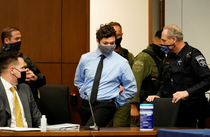 Kyle Rittenhouse, the teenager charged with killing two people and injuring another during demonstrations on the streets of Kenosha, Wisconsin, attends his extradition hearing in Lake County in Waukegan, Illinois, U.S., October 30, 2020.  (photo credit: NAM Y. HUH/POOL VIA REUTERS)