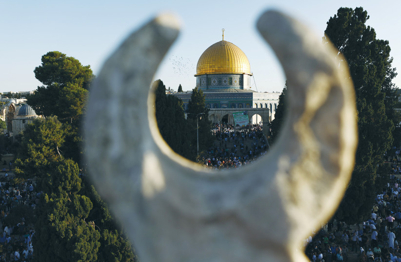 PALESTINIANS AND the Wakf Islamic religious trust have made it clear that Emiratis and Bahrainis are not welcome to pray in al-Aqsa Mosque on the Temple Mount in Jerusalem. (photo credit: AMMAR AWAD/REUTERS)