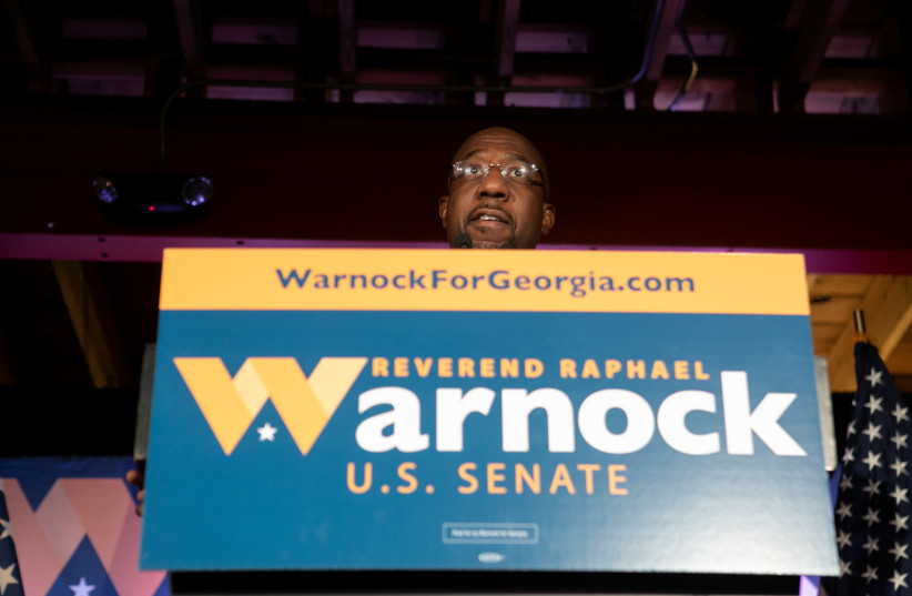 Democratic U.S. Senate candidate Rev. Raphael Warnock speaks at an Election Night event in Atlanta, Georgia, November 3, 2020. (photo credit: REUTERS)