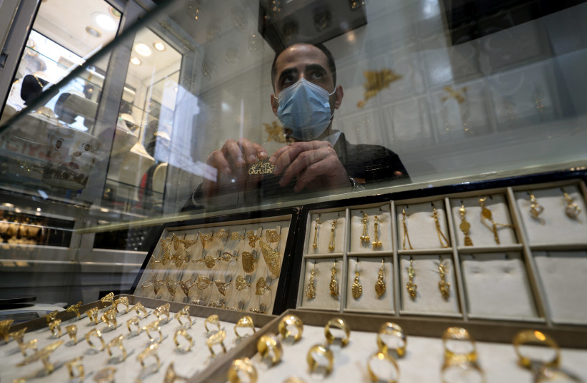 Gaza jeweller struggles to sell Christmas gold (photo credit: REUTERS)