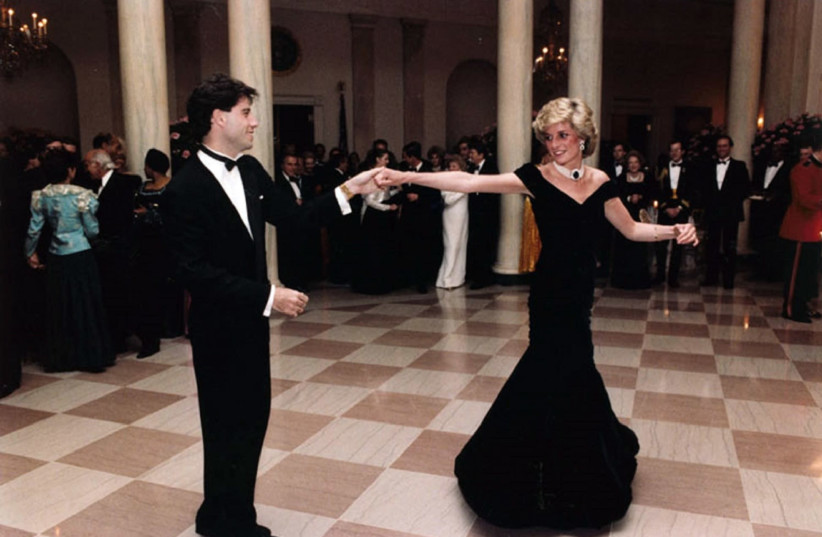 PRINCESS DIANA dances with movie star John Travolta at a White House ball hosted by US president Ronald Reagan, November 1985. (photo credit: PIXY.ORG)