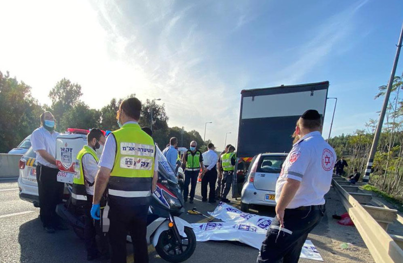 Scene of the car crash near Jerusalem that led to the deaths of a 5-year-old and a 7-year-old on Friday, December 11, 2020. (photo credit: ELAZAR RUBINSTEIN / ZAKA)