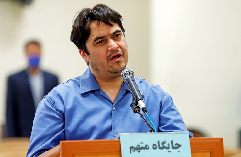 Ruhollah Zam, a dissident journalist who was captured in what Tehran calls an intelligence operation, speaks during his trial in Tehran, Iran June 2, 2020 (photo credit: MIZAN NEWS AGENCY/WANA (WEST ASIA NEWS AGENCY) VIA REUTERS)
