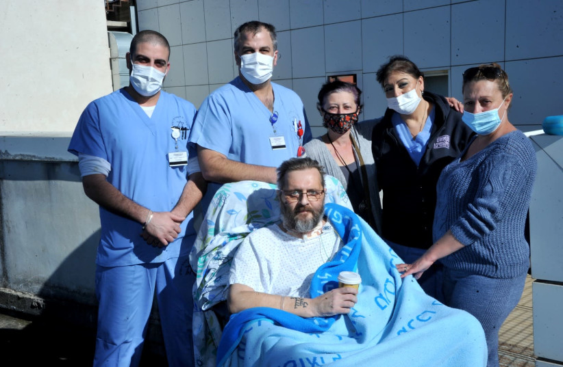 David Vadiansky and his partner, Aline, with some of the medical staff at the Galilee Medical Center in Nahariya. (photo credit: RONI ALBERT)