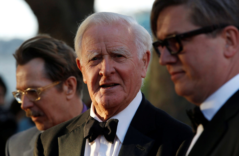 British author John Le Carre poses for photographers with British actor Gary Oldman and Swedish director Tomas Alfredson at the UK premiere of Tinker Tailor Soldier Spy in London (photo credit: REUTERS/SUZANNE PLUNKETT)