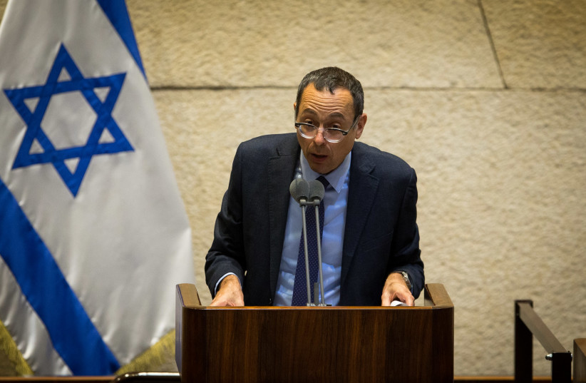 MK Zvi Hauser during a vote at the Knesset, the Israeli parliament in Jerusalem on August 24, 2020. (photo credit: OREN BEN HAKOON/FLASH90)