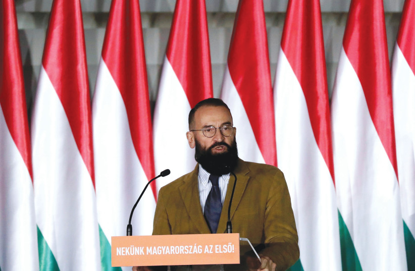 JÓZSEF SZÁJER delivers a speech in Budapest, Hungary, as part of the Fidesz Party’s campaign in the 2019 European Parliament elections. (photo credit: BERNADETT SZABO / REUTERS)