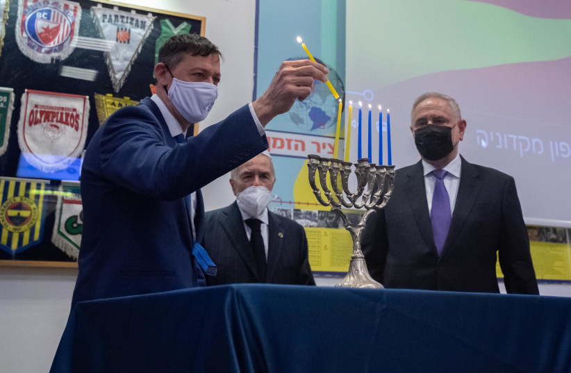 Robert Zinger, Shimon Mizrahi and Dan Orin take part in the ceremony highlighting Macedonian Jewry. (photo credit: ELAD GOLDSTEIN)