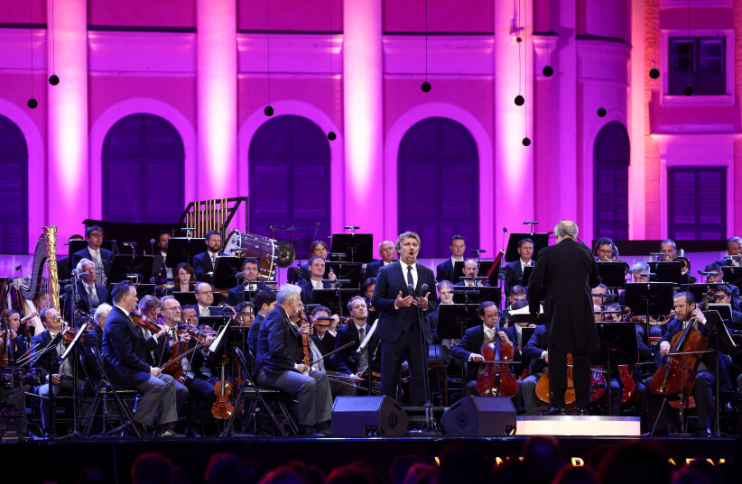 The Vienna Philharmonic Orchestra performs during the Summer Night Concert in September. One of the novel’s main characters played for the orchestra before Austria was taken over by the Nazis.  (photo credit: REUTERS/LISI NIESNER)