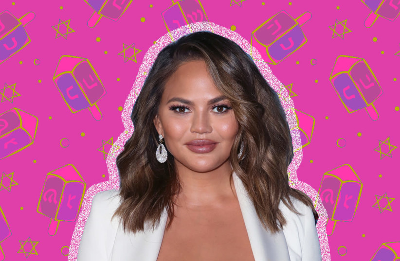 Chrissy Teigen expressing some Hanukkah envy as she viewed latkes frying: "Oh my gosh! Why have I not been doing this?! Christmas, what the heck?!" (David Livingston/Stringer/Getty Images Entertainment) (photo credit: GETTY IMAGES)