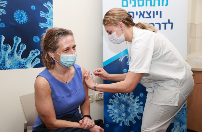 Head of Public Health Services Dr. Sharon Alroy-Preis receives the coronavirus vaccine, Rabin Medical Center-Beilinson Campus, December 20, 2020 (photo credit: RABIN MEDICAL CENTER)