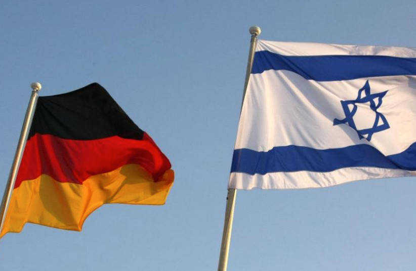 German and Israeli national flags (photo credit: REUTERS)
