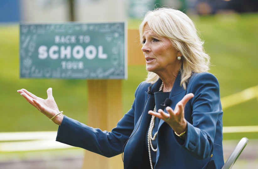 TANDING BEFORE a playground, Dr. Jill Biden speaks during a ‘back to school’ tour of Shortlidge Academy in Wilmington, Delaware, on September 1.  (credit: KEVIN LAMARQUE/REUTERS)