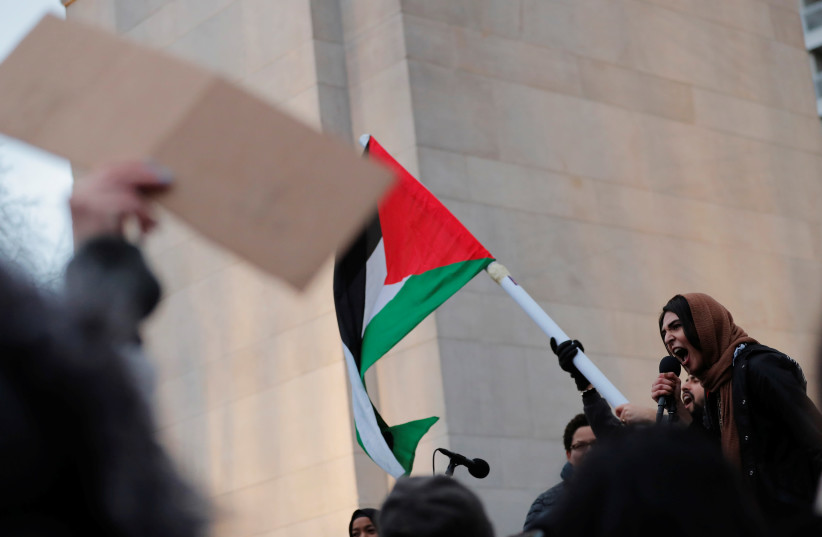 Activist Nerdeen Kiswani speaks out for Palestinian rights while taking part in a rally on International Women’s Day in Manhattan in New York City, New York, US, March 8, 2018. (credit: REUTERS/LUCAS JACKSON)