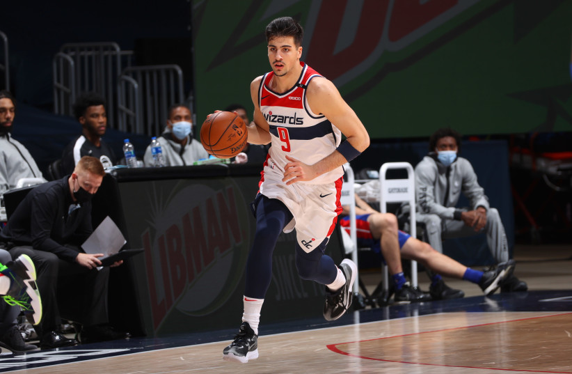 Deni Avdija plays in a preseason game for the Washington Wizards, the NBA team that drafted him in the first round of the 2020 draft. (credit: NED DISHMAN/NBA PHOTOS)