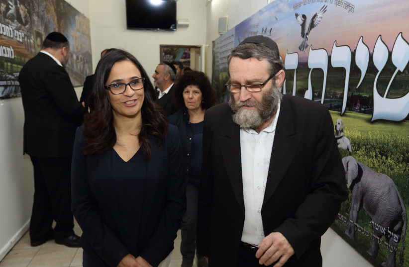 UNITED TORAH Judaism MK Moshe Gafni walks with Or Yehuda Mayor Liat Shohat during a tour at the Independent Education School of Science and Judaism in her city. The book explores how Judaism can still make sense in modern times. (photo credit: YAAKOV NAUMI/FLASH90)