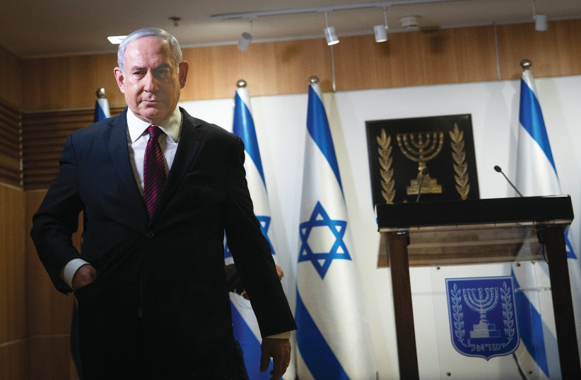 PRIME MINISTER Benjamin Netanyahu gives a statement in the Knesset on Tuesday. (photo credit: YONATAN SINDEL/FLASH 90)