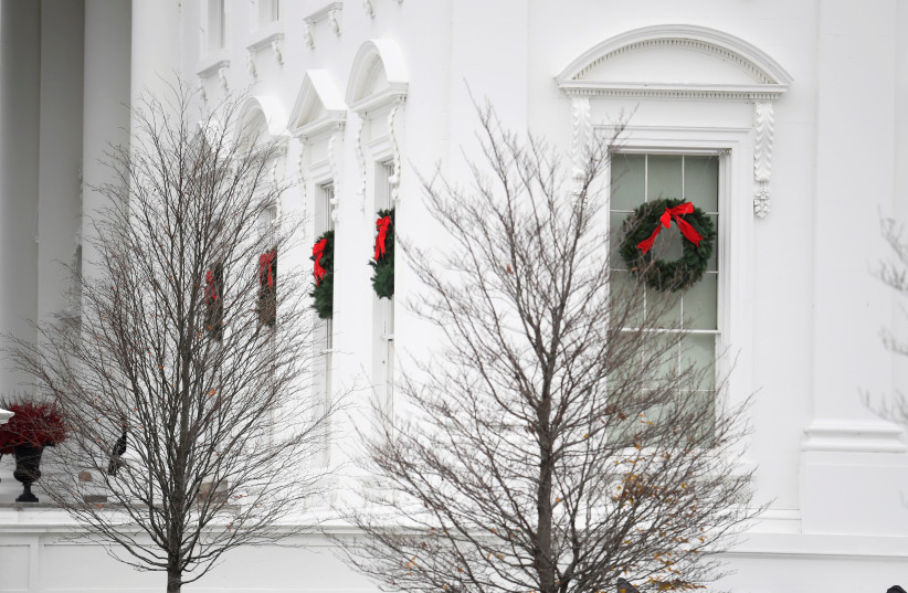 Christmas decorations are hung at the White House (photo credit: MIKE THEILER/REUTERS)