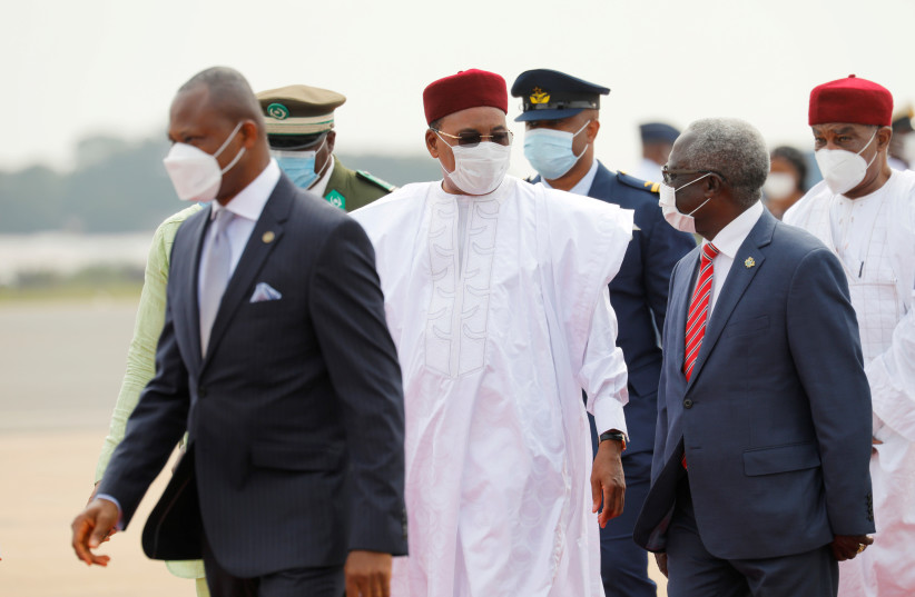 Niger's President Mahamadou Issoufou arrives at the airport for the Economic Community of West African States (ECOWAS) consultative meeting in Accra, Ghana September 15, 2020. (photo credit: REUTERS/FRANCIS KOKOROKO)